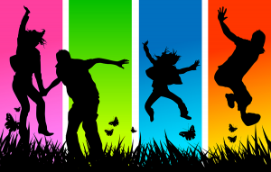 Silhouettes of people jumping against a multi-coloured background 