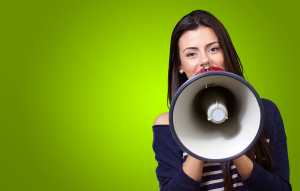 Woman speaking into a megaphone